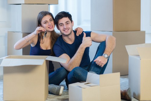 Moving team handling furniture during a residential relocation in Sweden