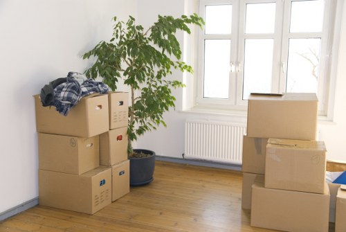 Supervisor reviewing safety procedures during a removals job