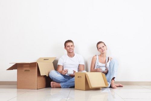 Apartment moving preparation in Sweden with packed boxes and furniture