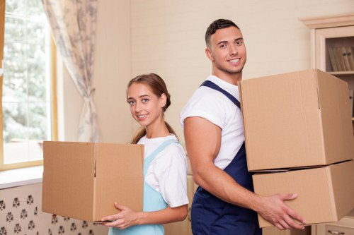 Apartment moving scene in Sweden with packed boxes